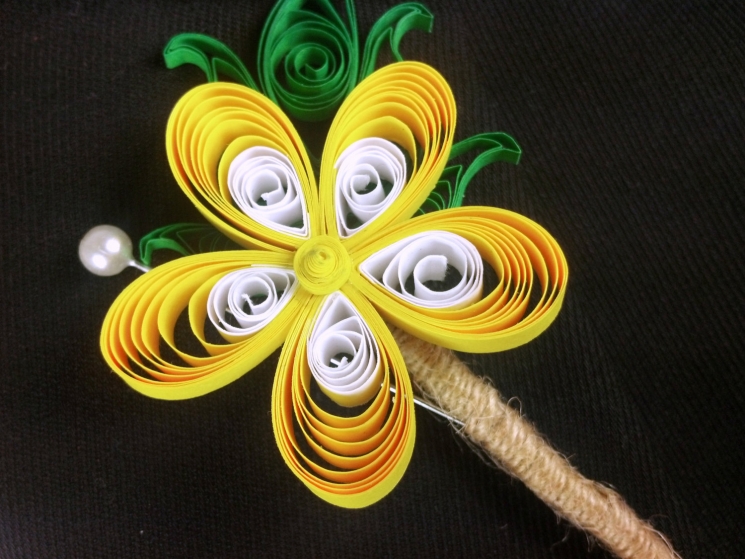 paper buttercup, yellow paper flower, paper quill boutonniere, yellow plumeria