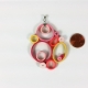 quilled pendant, shades of pink, sunset colors, cool colors, paper anniversary